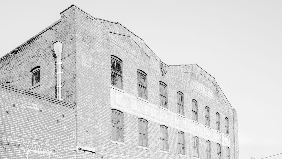 Historic photo of The Ficklen, a warehouse in Greenville NC that's revitalized as a food hall and hotel